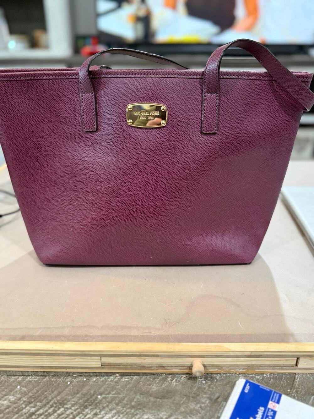 105. Burgundy Michael Kors Pebbled Leather tote bag